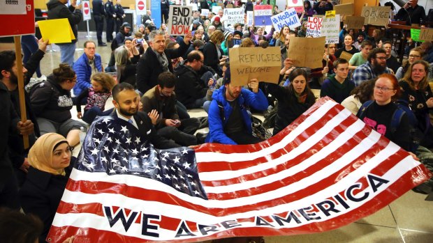 Sit down: A demonstration against Donald Trump's executive order on immigration at Seattle-Tacoma International Airport.