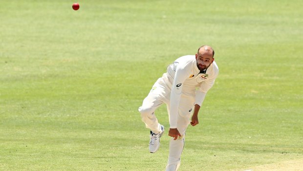 Snubbed: Nathan Lyon, used sparingly in this Test, bowls during day four.