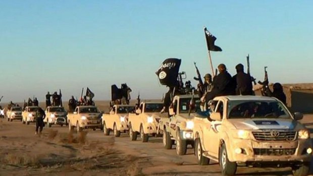 Militants of the Islamic State group ride in a convoy in one of the group's propaganda images.