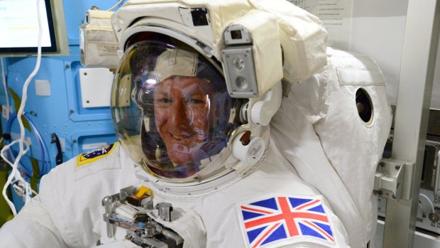 European Space Agency astronaut Tim Peake, of Britain, during the final fit check of his spacesuit before his International Space Station spacewalk.