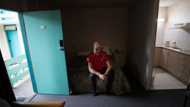 Tony Engellenner, 55, in his temporary room at the Coburg Motor Inn.