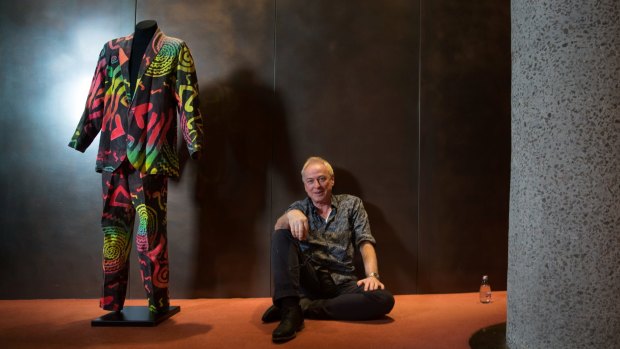 Eddie Rayner with one of his original Split Enz outfits, now stored at Arts Centre Melbourne's performing arts collection.