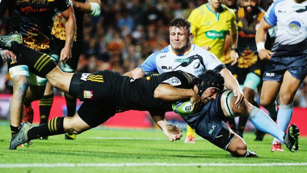 Charlie Ngatai of the Chiefs dives over to score his fourth try during the round-five Super Rugby match between the Chiefs and the Western Force at FMG Stadium in Hamilton, New Zealand.  