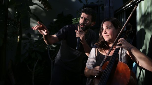 Actor Hazem Shammas, with cellist Oonagh Sherrard, says performing at a private residence is an intimate experience: "Part of the magic of the show is that you forget what backyard you are in."