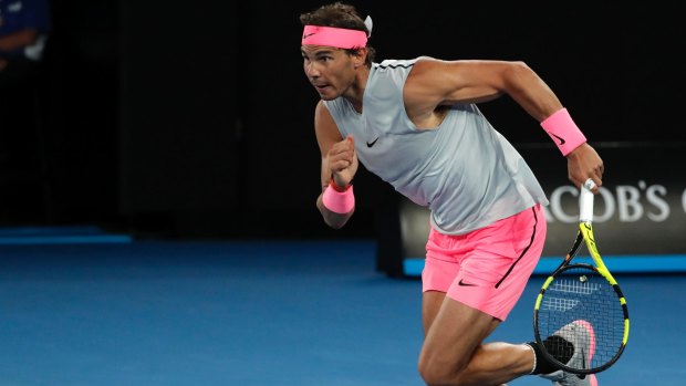 Rafael Nadal dashes to reach the ball.