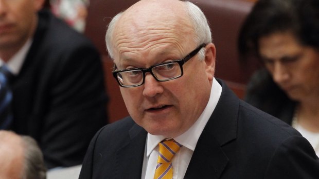 George Brandis says he "didn't feel threatened" by Hicks at the ceremony. 