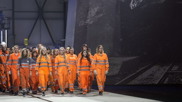 Artists perform during the opening show directed by German director Volker Hesse, on the opening day of the Gotthard rail tunnel.
