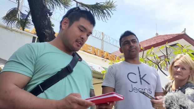 Michael Chan and Chinthu Sukumaran, brothers of Andrew Chan and Myuran Sukumaran, at Kerobokan on Sunday.