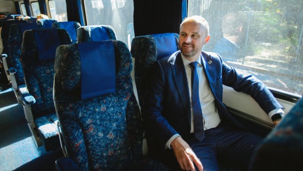 ACT Chief Minister Andrew Barr aboard a train to Sydney where he will meet with NSW Minister for Infrastructure Andrew Constance.