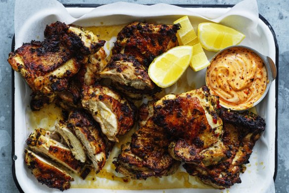 Barbecued chicken thighs with spicy mayo.