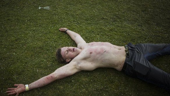 A punter oblivious to the hail storm.