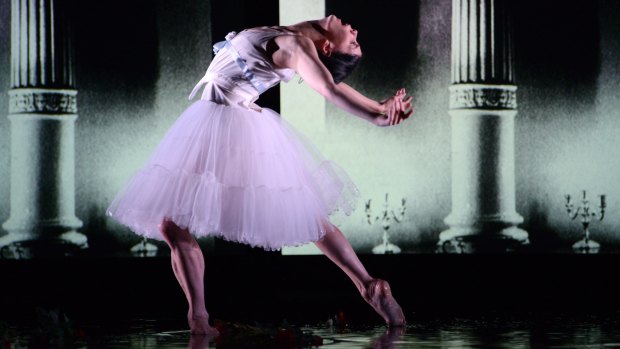 Water floods the stage like tears during Natalia Osipova's performance. Photo: Regis Lansac
