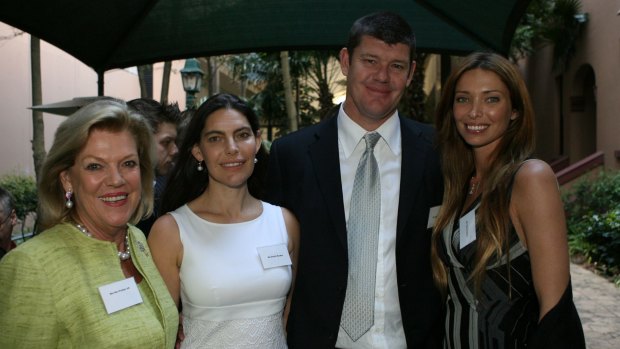 Smile:  James Packer, flanked by sister Gretel (left), with wife Erica and mother Ros at an earlier, happy, engagement with a Herald photographer.
