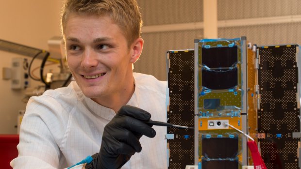 UNSW Canberra space test engineer Philippe Lorrain carries out initial acceptance tests on the BRMM (Buccaneer Risk Mitigation Mission) spacecraft bus from Pumpkin, Inc. Buccaneer CubeSat. supplied photo. 26 November 2017.