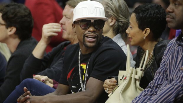 Floyd Mayweather was photographed sitting courtside at a basketball game between the Los Angeles Clippers and the Phoenix Suns soon after the incident.