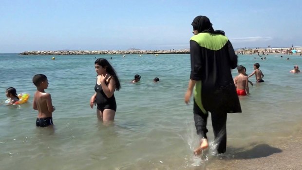 A Muslim woman enjoying the beach in Marseille.