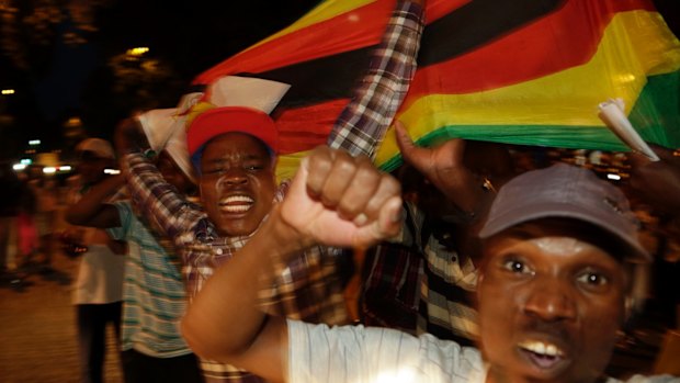 Zimbabweans celebrate in neighbouring Hillbrow, Johannesburg, South Africa.