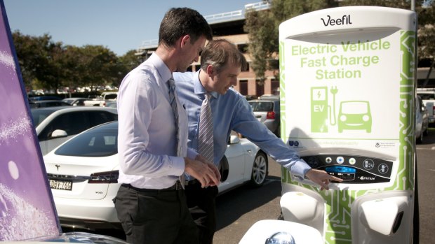 Energy Minister Mark Bailey with Tritium managing director Dr David Finn at the charging station.