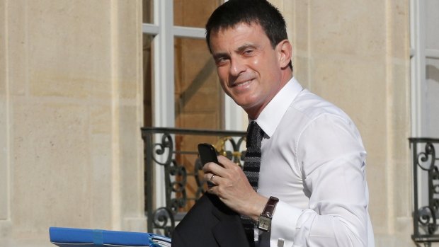 French Prime Minister Manuel Valls arrives at the weekly cabinet meeting at the Elysee presidential palace in Paris on Wednesday.