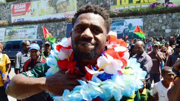 Warm welcome: James Segeyaro received plenty of cheers on his arrival in Port Moresby.