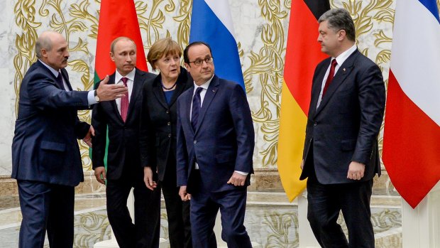 Deal: Belarus President Alexander Lukashenko, Russian President Vladimir Putin, German Chancellor Angela Merkel, French President Francois Hollande and Ukrainian President Petro Poroshenko in Minsk.