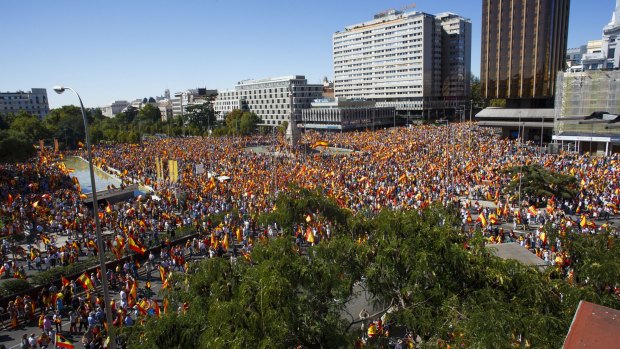 Demonstrators gather in Colon Square during a protest for Spanish unity in Madrid on Saturday.