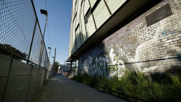 Three men from the apartment pictured to the right ran to the aid of a woman 