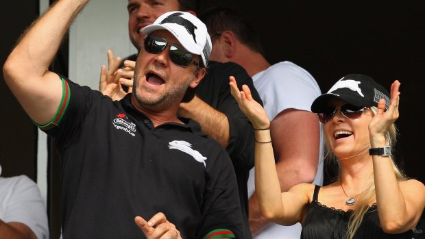 Happier times: Russell Crowe and his then wife Danielle Spencer celebrate a Rabbitohs try in 2009.