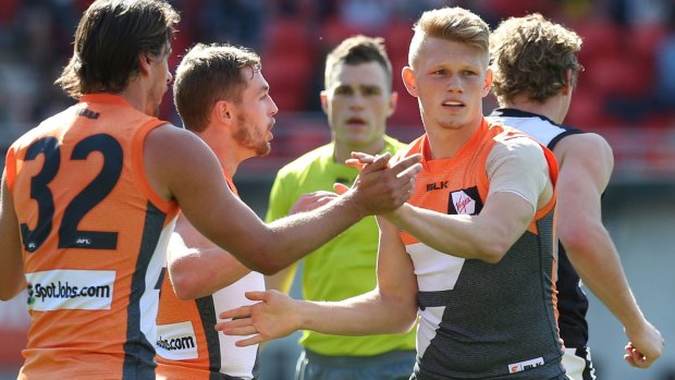 Carlton have joined the race to secure Adam Treloar (right).