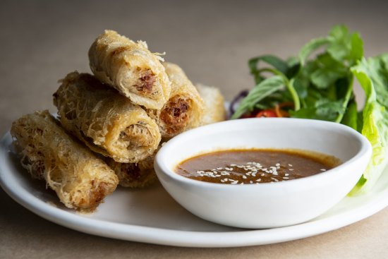 Deep-fried crab net rolls with blistered seafood. 
