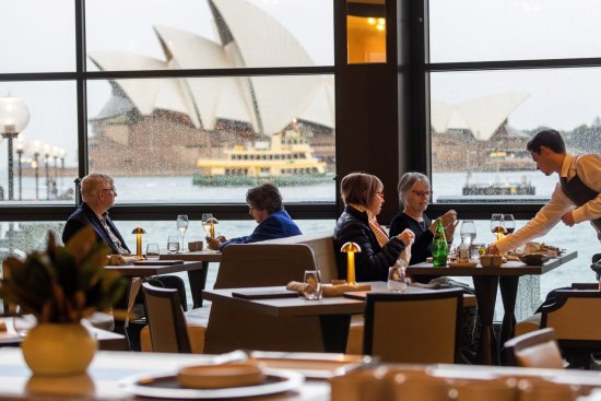 The dining room backdropped by the Sydney Opera House.