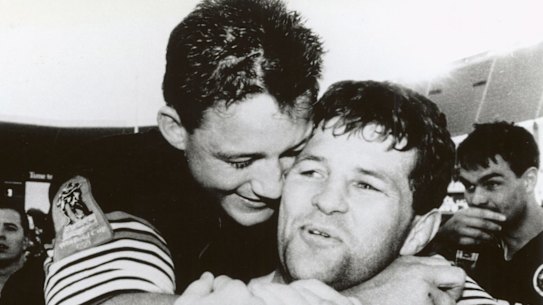 Royce Simmons and Mark Geyer celebrate their 1991 grand final victory.
