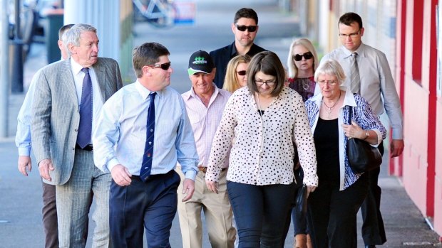 Wagga solicitor Ian Donald (far left) with members of Kim Hunt's family. 