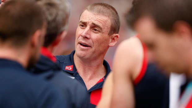 Demons coach Simon Goodwin wants his midfield to step up with three rucks on the sideline.