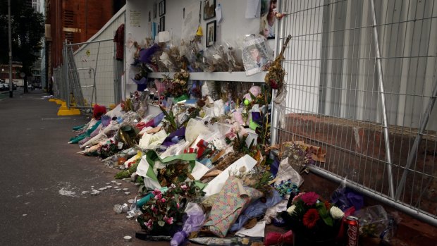 A shrine for the three pedestrians killed when a wall collapsed at the Grocon site.