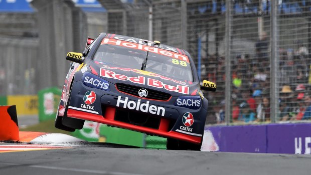 Wetter weather ahead: Jamie Whincup from Red Bull Holden Racing drives through a chicane during a practice session ahead of the Gold Coast 600 Supercars event at Surfers Paradise.