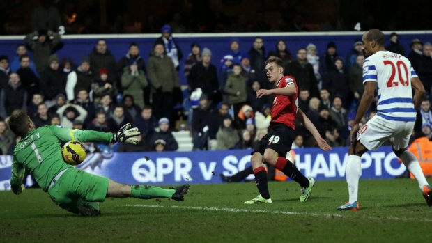 Game breaker: Manchester United's James Wilson scores his side's second goal against QPR.