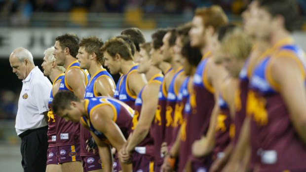 FAIRFAX. SPORT. AFL. BRISBANE. GABBA.  Brisbane Lions V Richmond Tigers at the Gabba. Leigh Matthews and the Brisbane Lions during the minutes scilence for Anzac Day.  Picture by Paul Harris.  Saturday 22 April 2006.