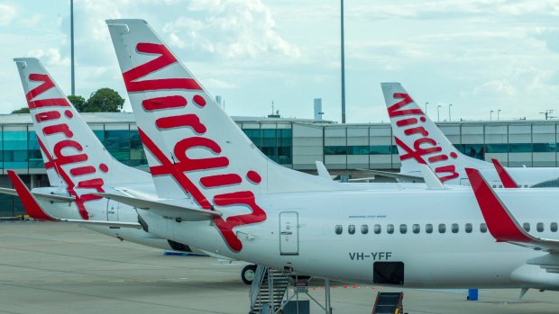 The ATSB has revealed a drone came close to colliding with a Virgin flight on approach to Brisbane Airport.