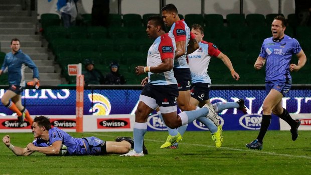 Point to prove: Alex Newsome adds to the Waratahs' misery.