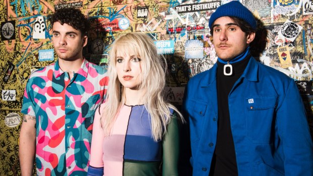 Paramore's lead vocalist Hayley Williams with guitarist Taylor York and drummer Zac Farro.