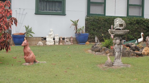 A collection of statues in <i>Shit Gardens</i>.