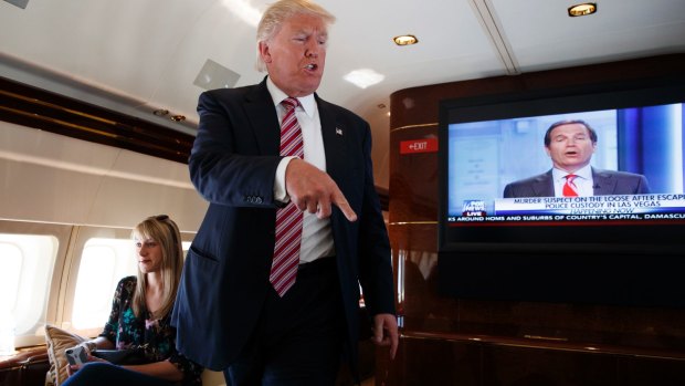 Republican presidential candidate Donald Trump aboard his campaign plane on Monday.