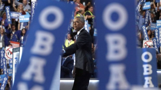 The crowd watches President Barack Obama as he speaks during the Democratic National Convention.