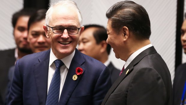 Prime Minister Malcolm Turnbull speaks with Chinese President Xi Jinping during a leaders' retreat at the APEC Summit in Vietnam last month.