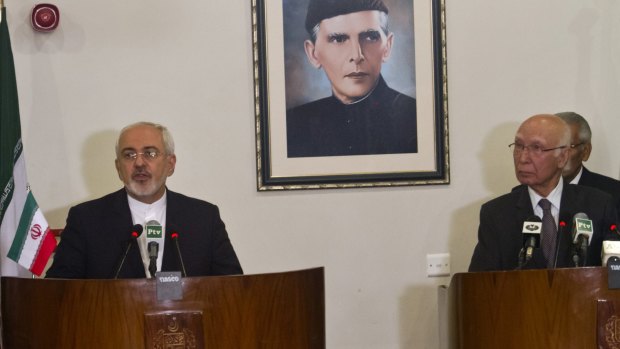 Iranian Foreign Minister Mohammad Javad Zarif, left, with the Pakistani Prime Minister's Adviser on Foreign Affairs Sartaj Aziz in Islamabad on Wednesday.