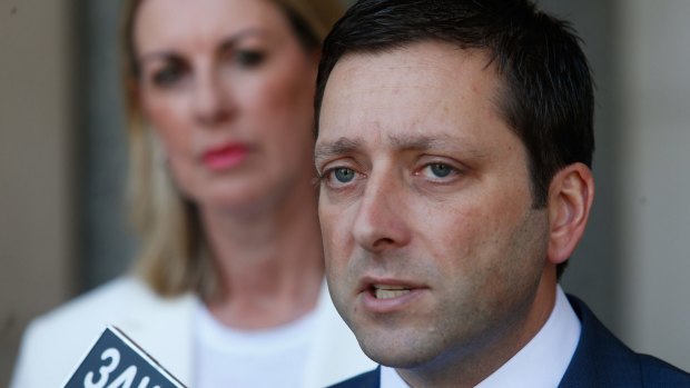 Opposition Leader Matthew Guy with opposition front bencher Georgie Crozier in the background.