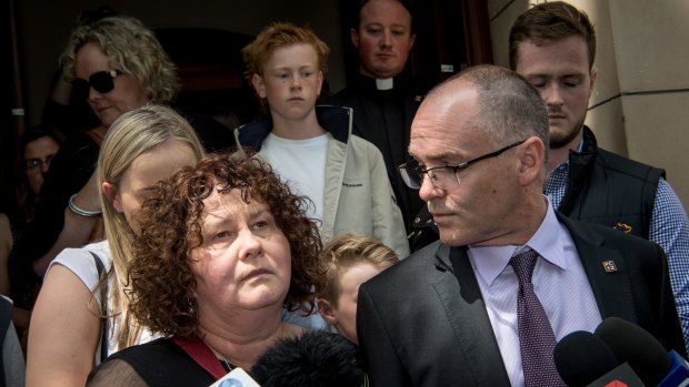 Patrick Cronin's parents Robyn and Matt speak outside court on Friday.
