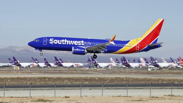 A Southwest Airlines Boeing 737 Max aircraft lands at the Southern California Logistics Airport in the high desert town of Victorville.