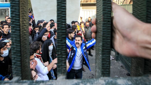 University students attend an anti-government protest inside Tehran University on December 30.